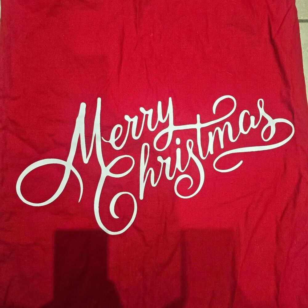 Red cotton Merry Christmas sack with white 'Merry Christmas' script